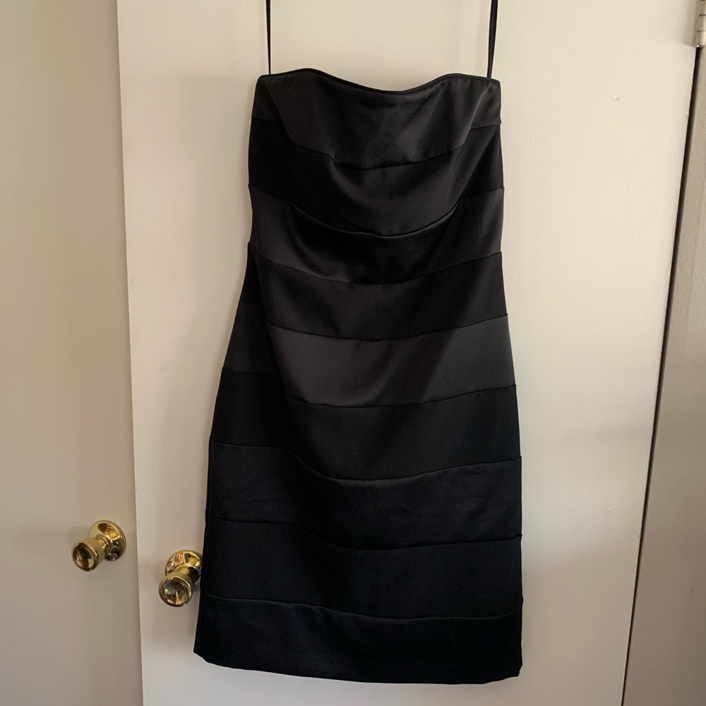 Strapless black cocktail dress. Fully lined. New with tags. Women's size 8
